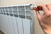 How to install a tap on a heating battery