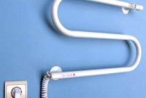 Features of installing an electric heated towel rail in the bathroom