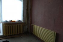 Is it possible to remove the heating radiator in the end apartment