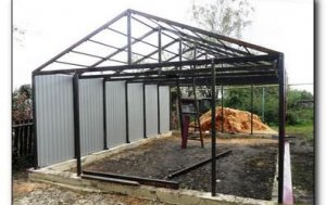 Metal frame garage made of corrugated board and profile pipe