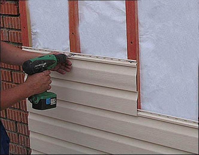 Como embainhar uma casa com tapume com isolamento