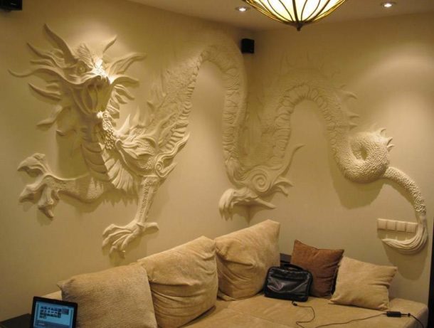 Gypsum bas-relief, created by hand directly on the wall