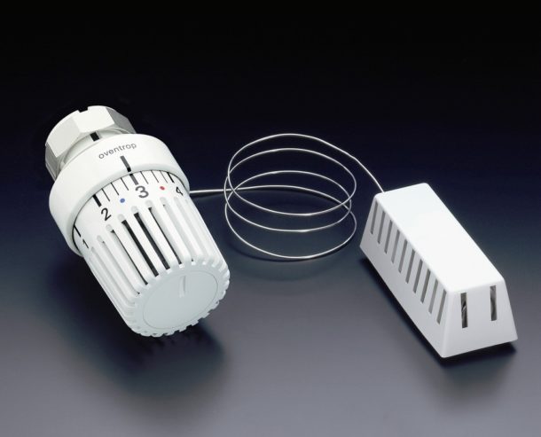 Adjustment system with remote sensor