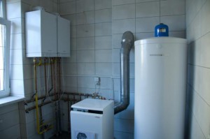 Heating devices in water heating systems