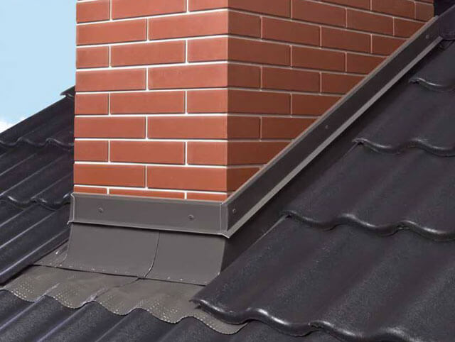 Chimney passing through a wooden ceiling